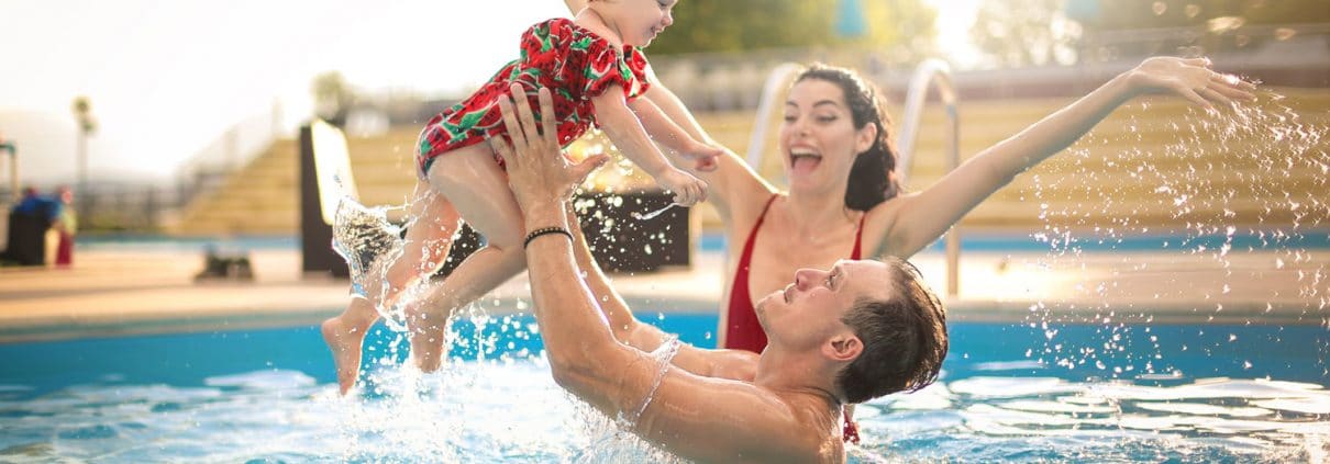 Family in vacation rental swimming pool