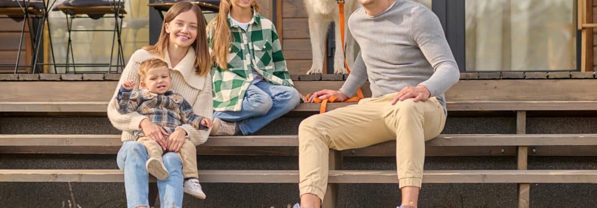 dog with family on porch